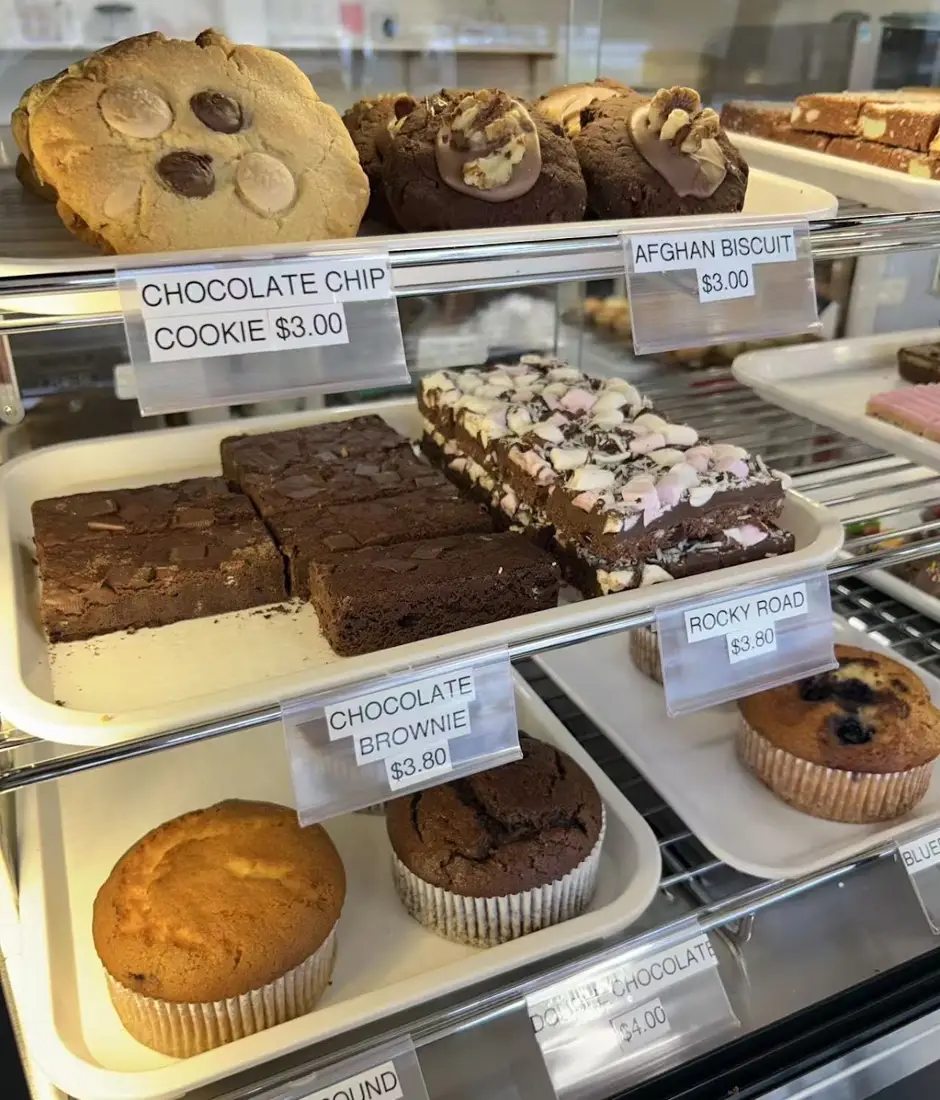 Afghans, brownies, rocky road and muffins in the sweet cabinet